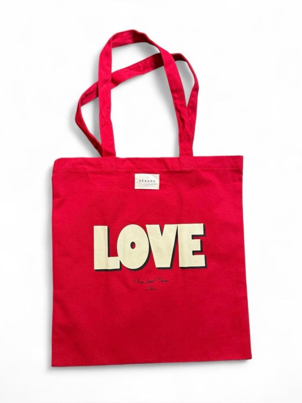 Sézane vibrant and stylish red tote bag with 'LOVE' text. NWOT. Soft canvas